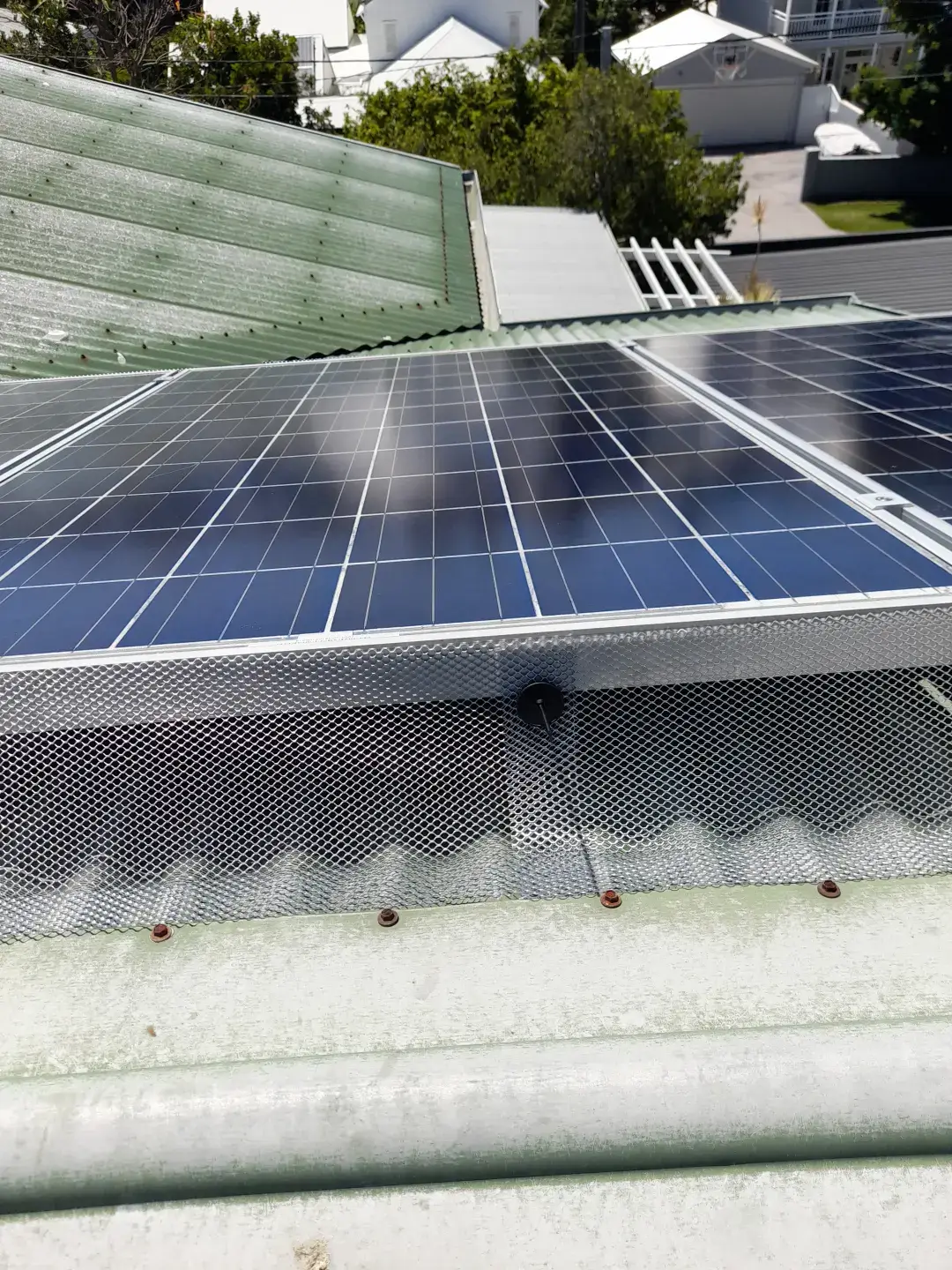 Gutter cleaning job on a residential roof